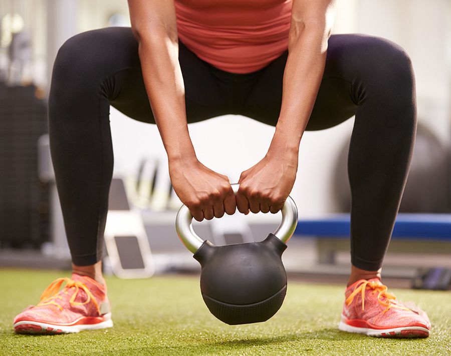 1200-woman-lifting-kettlebell_0.jpg