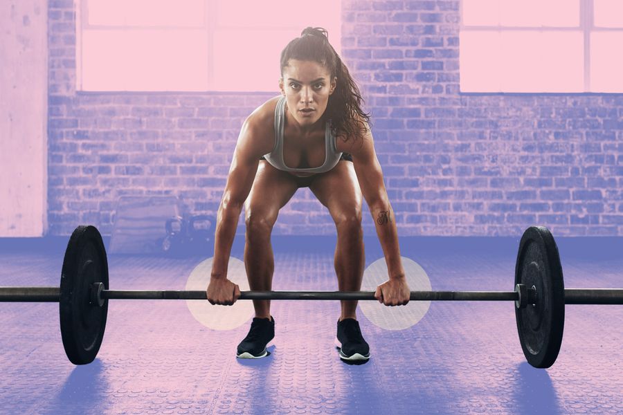 Woman performing deadlift exercise with weight bar using Pronated grip