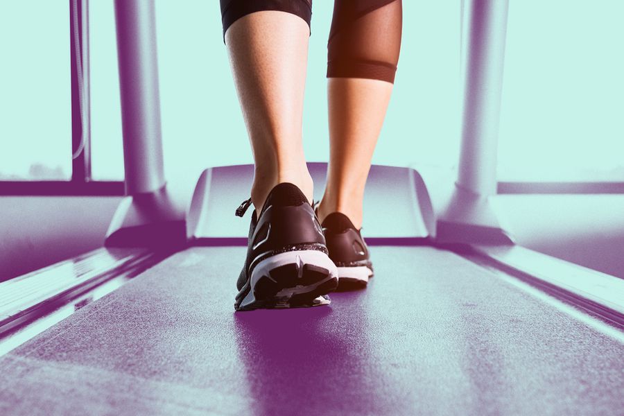 Woman Walking on Treadmill